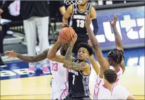  ?? John Peterson / Associated Press ?? Georgetown forward Jamorko Pickett (1) is one of the best rebounders in the Big East, averaging 8.4 per game.