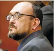  ?? LUIS SÁNCHEZ SATURNO THE NEW MEXICAN ?? Aaron Dean Chavez, a former teacher at Santo Niño Regional Catholic School, listens to opening statements Tuesday in his District Court trial. Chavez is charged with three counts of criminal sexual contact of a minor.