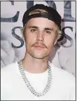  ??  ?? In this Jan. 27, 2020 file photo, Justin Bieber arrives at the Los Angeles premiere of ‘Justin Bieber: Seasons.’ Bieber is set to return to the VMAs stage for an all-star caliber event that will air Sunday night at 8 p.m. EDT. He leads the show with seven nomination­s. (AP)