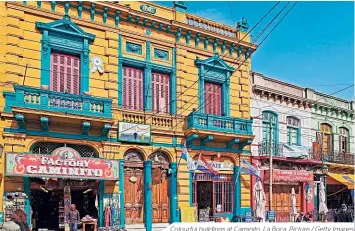  ??  ?? Colourful buildings at Caminito, La Boca. Picture / Getty Images