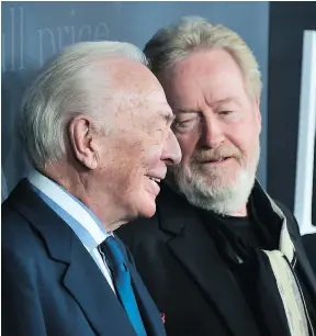  ?? GETTY IMAGES ?? Christophe­r Plummer, left, and director Ridley Scott launched a hastily assembled nine-day reshoot of Kevin Spacey’s scenes in the movie All the Money in the World.