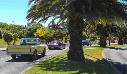  ??  ?? Top: Entrants in the Saturday cruise begin to arrive Above: Tidy Chevrolet pickup follows the group out of the bay Below left: Early Plymouth dressed up and cruising Below right: This ’45 Ford pickup may well have seen war service