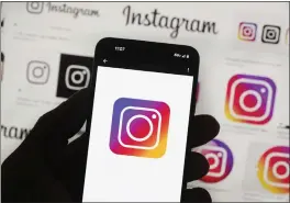  ?? MICHAEL DWYER — THE ASSOCIATED PRESS FILE ?? Instagram says it's testing new tools to protect young people and combat sexual extortion. One would be able to blur nude images in direct messages.