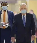  ?? AP photo ?? Senate Majority Leader Mitch McConnell of Kenntucky, walks past reporters on Capitol Hill in Washington on Tuesday.