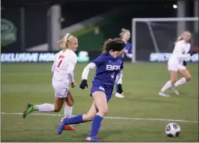  ?? KYLE SOOY — FOR THE MORNING JOURNAL ?? Bay’s Avery Alexy tries to get the ball around Cincinnati Indian Hill’s Ashleigh Prugh during the Division II state final at MAPFRE Stadium on Nov. 9.