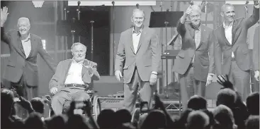  ?? L.M. Otero / The Associated Press Former presidents Jimmy Carter (from left), George H.W. Bush, George W. Bush, Bill Clinton and Barack Obama gather on stage to open a concert at College Station, Texas, to raise relief funds for victims of Hurricanes Harv ??