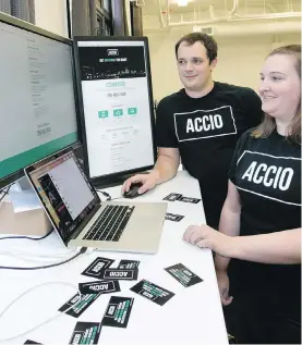  ??  ?? Mike Rowe and Carla Smart, co-founders of Accio, which delivers anything anywhere in the city, are awaiting new ride-share rules from the province.