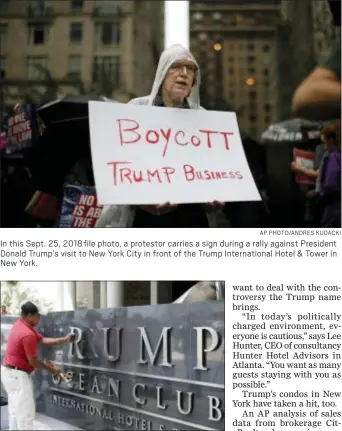  ?? AP PHOTO/ANDRES KUDACKI ?? In this Sept. 25, 2018 file photo, a protestor carries a sign during a rally against President Donald Trump’s visit to New York City in front of the Trump Internatio­nal Hotel &amp; Tower in New York.