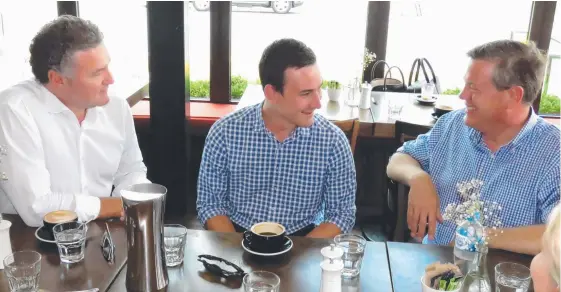  ??  ?? Opposition Leader Tim Nicholls meets with Surfers Paradise MP John-Paul Langbroek and Bonney candidate Sam O’Connor at the Catalina café in Southport.