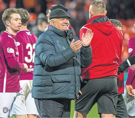  ?? Picture: SNS. ?? Dick Campbell celebrates Arbroath’s win at Tannadice in what has been a stellar season so far.