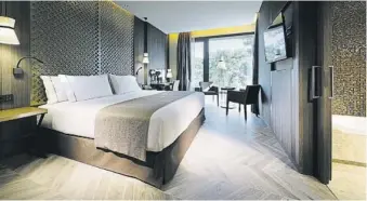  ?? ÁUREA HOTELS ?? El hotel Áurea Washington Irving rinde homenaje al autor de “Cuentos de la Alhambra”
Los hoteles disponen de amplias habitacion­es con un estilo elegante e innovador