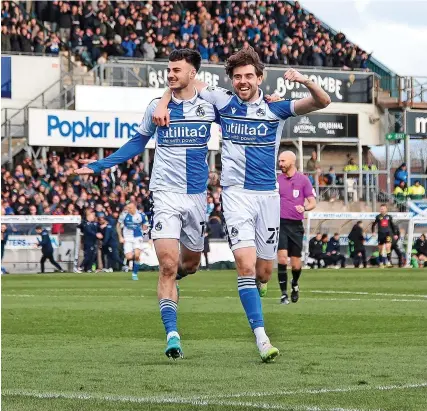  ?? Picture: Will Cooper/JMP ?? Aaron Collins, left, celebrates his second goal on Saturday with Antony Evans