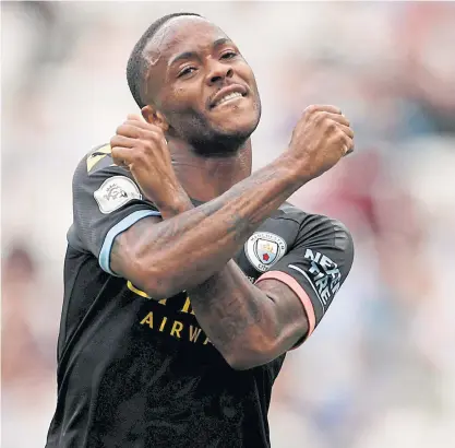  ??  ?? Manchester City’s Raheem Sterling celebrates after scoring his third goal against West Ham last week.