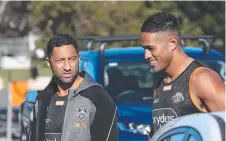  ??  ?? Benji Marshall (left) arriving at a Tigers training session.