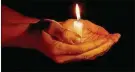  ?? DREAMSTIME/ TNS ?? Light your candle, and step forward.