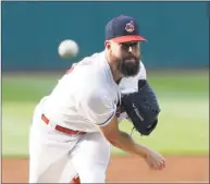  ?? Tony Dejak / Associated Press ?? Indians pitcher Corey Kluber delivers in the first inning against the New York Yankees in July in Cleveland.