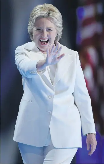  ?? TIMOTHY A. CLARY/AFP/GETTY IMAGES ?? Hillary Clinton made history Thursday at the Democratic National Convention in Philadelph­ia, Pa., as the first woman presidenti­al nominee for a major U.S. party. See story on NP1.