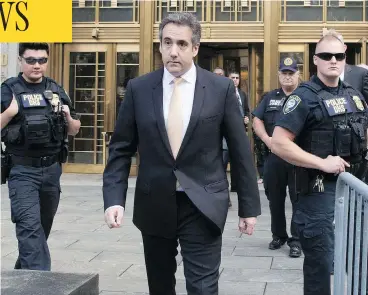  ?? MARY ALTAFFER / THE ASSOCIATED PRESS ?? Michael Cohen leaves U.S. federal court in New York Tuesday, where he pleaded guilty to campaign finance fraud charges stemming from hush-money payments to porn actress Stormy Daniels and Playboy model Karen McDougal.