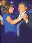  ?? ADOLPHE PIERRE-LOUIS/JOURNAL ?? Gov. Susana Martinez dances with husband, Chuck Franco, during her 2010 Inaugural Ball. The finances of her inaugural committee were the subject of a federal inquiry.