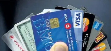 ?? THE CANADIAN PRESS FILES ?? Major credit cards are seen in this photo illustrati­on.