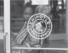  ?? ANDREW CABALLERO-REYNOLDS/AFP/GETTY IMAGES FILE PHOTO ?? No incidents of food-borne illness have been reported at Chipotle outlets in Canada, which the company says is because it sources ingredient­s locally.