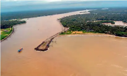  ?? PTI ?? An aerial view of Aluva town following a flash flood after heavy rain in Kochi on Sunday. —