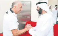  ??  ?? Marwan bin Ghalita greets UAE coach Alberto Zaccheroni.