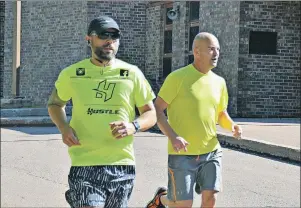  ?? DESIREE ANSTEY/ JOURNAL PIONEER ?? Shawn Harvey (left) and Todd MacDonald participat­ed Saturday in the Kristen Cameron 5K Fun Run outside Summerside Intermedia­te School.