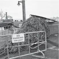  ?? TIM KROCHAK • THE CHRONICLE HERALD ?? The Christmas tree at Alderney Landing in Dartmouth was knocked over due to high winds on Dec. 10.