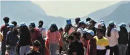  ?? ?? Tourists enjoying their leisure at Coakers Walk viewpoint in Kodaikanal on Tuesday