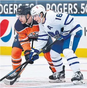  ?? ANDY DEVLIN GETTY IMAGES ?? The NHL’s rules of engagement have changed. Mitch Marner and the Leafs didn’t take a single penalty against Patrick Russell and the Oilers in a hotly anticipate­d matchup.