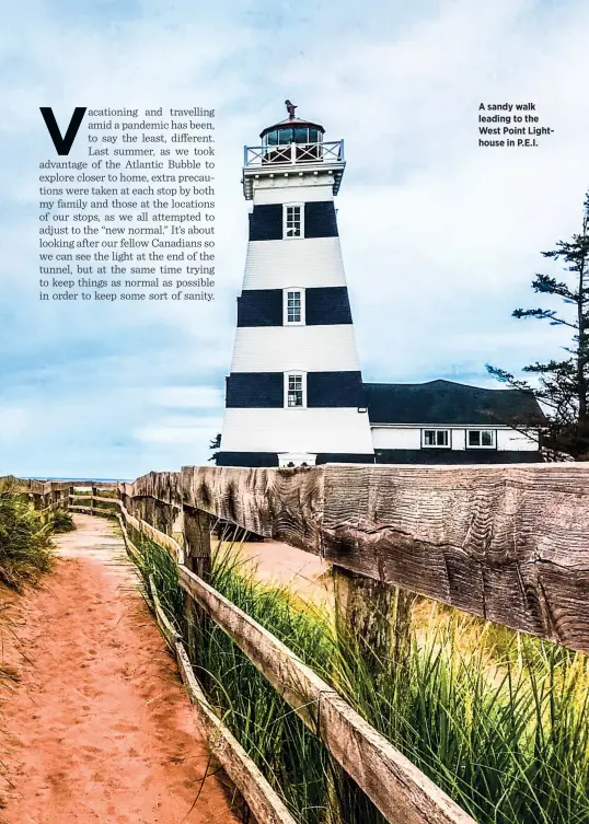  ??  ?? A sandy walk leading to the West Point Lighthouse in P.E.I.