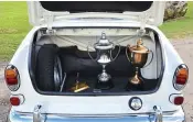 ??  ?? Burke Snr’s concours trophies back in their winner’s boot