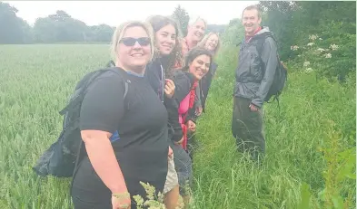  ??  ?? Staff from Royal Bank of Scotland on a charity walk.