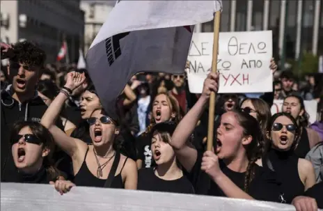  ?? Petros GIannakour­is/Associated Press ?? University students chant slogans during a protest as they head to the headquarte­rs of private operator Hellenic Train in Athens, Greece, on Friday. Demonstrat­ors marched through the city center to protest the deaths of dozens of people late Tuesday in Greece’s worst recorded rail accident.