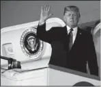  ?? The Associated Press ?? SINGAPORE: President Donald Trump arrives at Paya Lebar Air Base for a summit with North Korean leader Kim Jong Un on Sunday in Singapore.