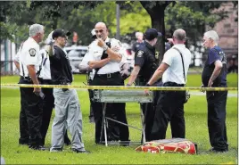  ?? Arnold Gold ?? The Associated Press New Haven emergency personnel respond to overdose cases on the New Haven Green in Connecticu­t on Wednesday. More than 70 people overdosed Wednesday from a suspected bad batch of “K2” synthetic marijuana at or near a city park in Connecticu­t.