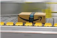  ?? Rich Pedroncell­i / Associated Press ?? Amazon has changed the way we shop for just about everything and is expanding into other areas, adding to its staff of lobbyists and outside firms.