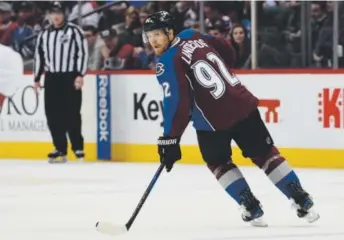  ??  ?? Avalanche forward Gabe Landeskog is the 24-year-old captain of a team that has lost 43 of its 60 games. “There’s no handbook on how to handle things like this,” he says. John Leyba, The Denver Post