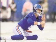  ?? Adam Hunger / Associated Press ?? New York Giants quarterbac­k Daniel Jones looks up after being tackled during the first half against the Green Bay Packers in December.