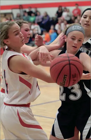  ??  ?? Saddle Ridge’s LaTyah Barber (left) and Gordon Lee’s Marianne Beliveau go after a loose ball during last week’s NGAC clash in Rock Spring. The Lady Trojans staved off a late Lady Mustangs’ rally to win 27-25. (Messenger photo/Scott Herpst)
Lakeview...