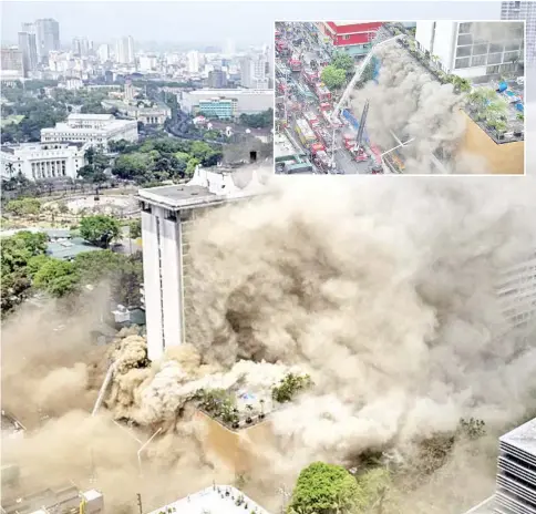  ?? — AFP photo ?? Heavy smoke engulfs the Waterfront Manila Pavilion building.