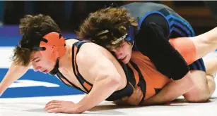  ?? RICK KINTZEL/THE MORNING CALL ?? Nazareth’s Charlie Bunting, top, finished atop the 133-pound bracket at the Class 3A Northeast Regional tournament.