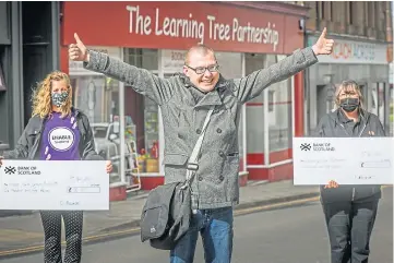  ??  ?? THUMBS UP: Connor Black with Enable’s Avril Muir and Morag Mckenzie of LTP.