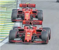  ??  ?? Clash: Ferrari drivers Sebastian Vettel and Charles Leclerc saw red during the race yesterday