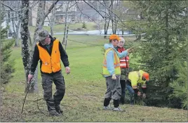  ?? AMANDA JESS/THE NEWS ?? The Pictou County Volunteer Ground Search and Rescue team was combing an area near the Maranatha Bible Church on Abercrombi­e Road early Thursday evening, looking for evidence and items reporting missing as part of an investigat­ion into multiple thefts...