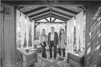  ?? [ALLEN J. SCHABEN/LOS ANGELES TIMES] ?? Jim Brady, center, chief executive of AToN Center, a rehab facility in Encinitas that he started with his wife, Patricia Brady, left, more than a decade ago, poses at the facility with their daughter, Pat, chief operating officer.