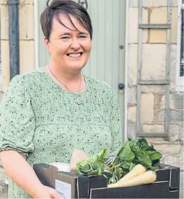  ??  ?? CREAM OF THE CROP: Lesley Duffy, who helps run Falkland Neighbourf­ood.