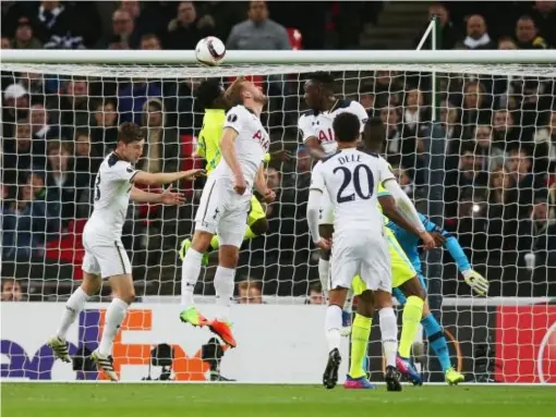  ??  ?? Tottenham bid to defend a Gent corner-kick (Getty)