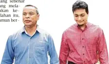  ??  ?? FATHI (kanan) bersama bapanya, Datuk Nadzri Ismail keluar dari bangunan mahkamah.